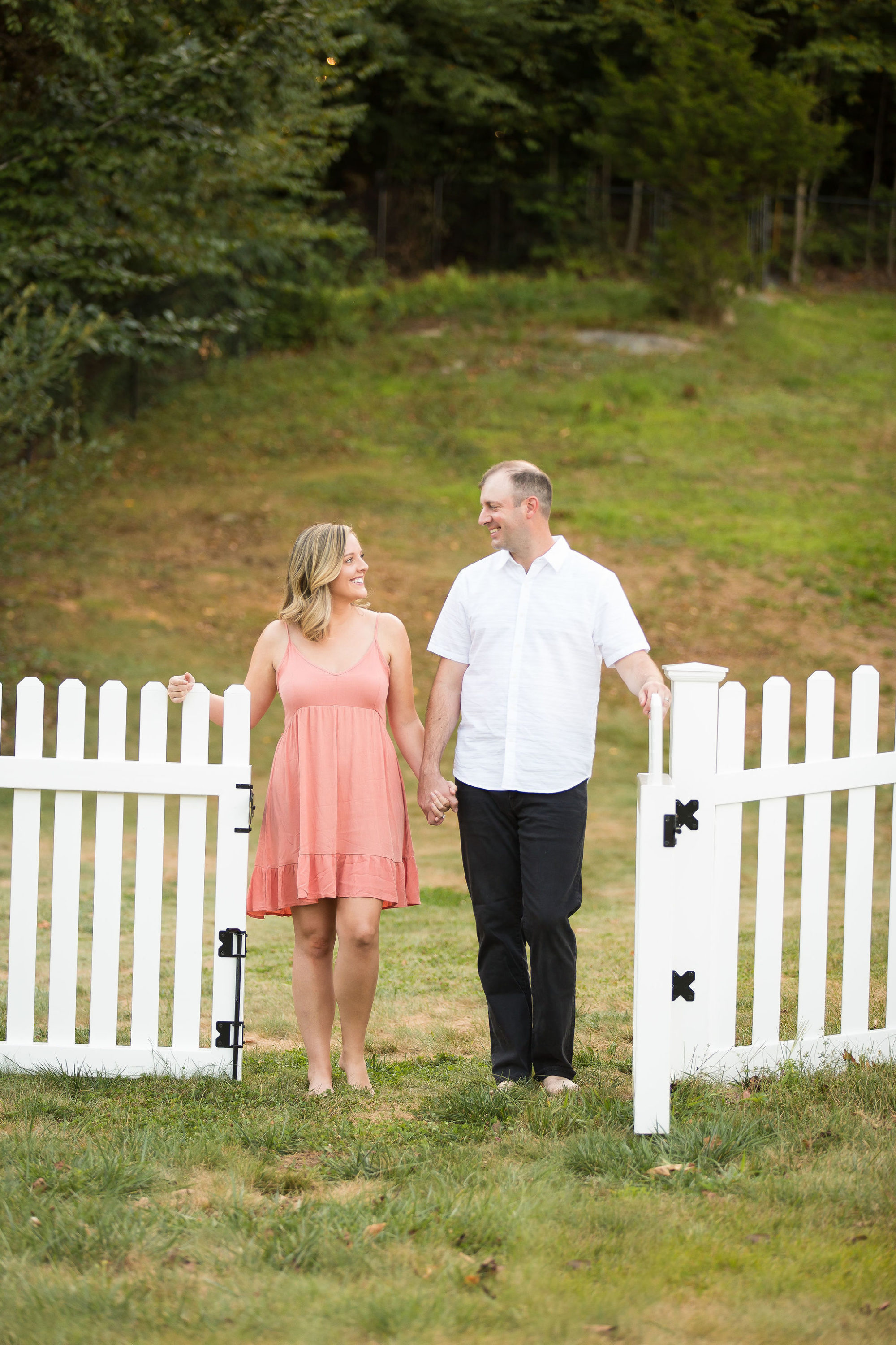 wedding anniversary lifestyle session fence pose